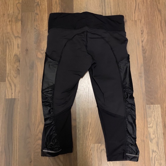 Lululemon black crops with “leather” accents - Picture 2 of 3
